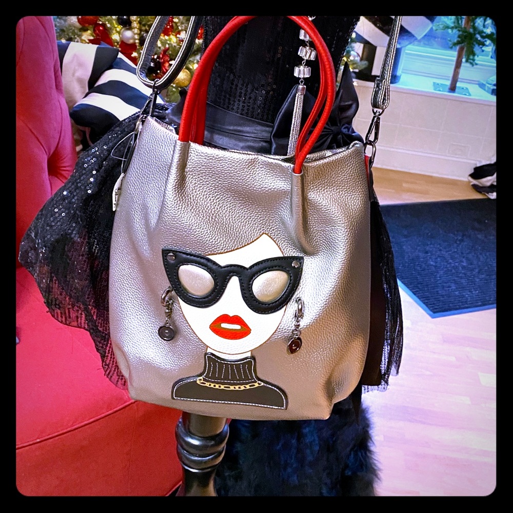 Faux leather embellished handbag